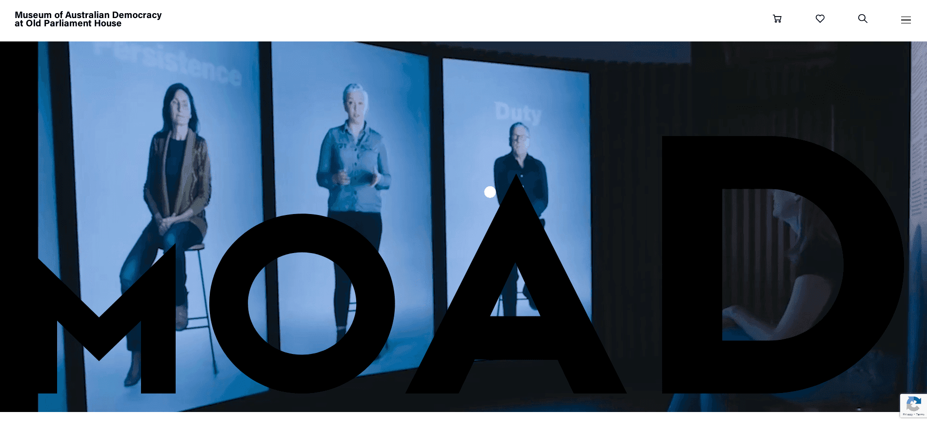 Three women displayed on large vertical screens in a dark room at the Museum of Australian Democracy.