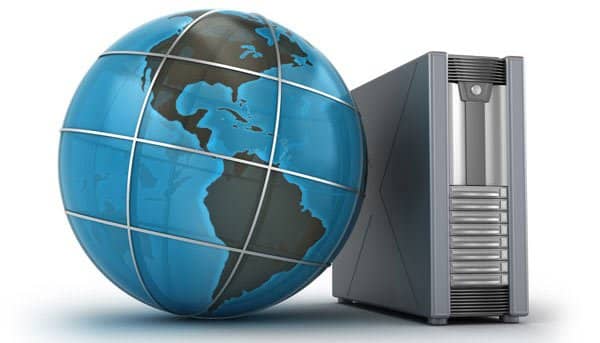 A 3D globe showing the Americas next to a silver and black desktop computer tower on a white background.
